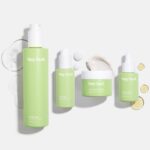 Four Hey Bud hemp skincare products arranged on a plain white surface.