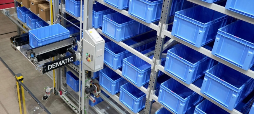 Dematic Multishuttle FD system handling blue storage totes in an automated warehouse shelving system.