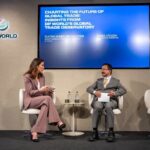 Emma Crosby interviews DP World CEO Sultan Ahmed bin Sulayem on stage.