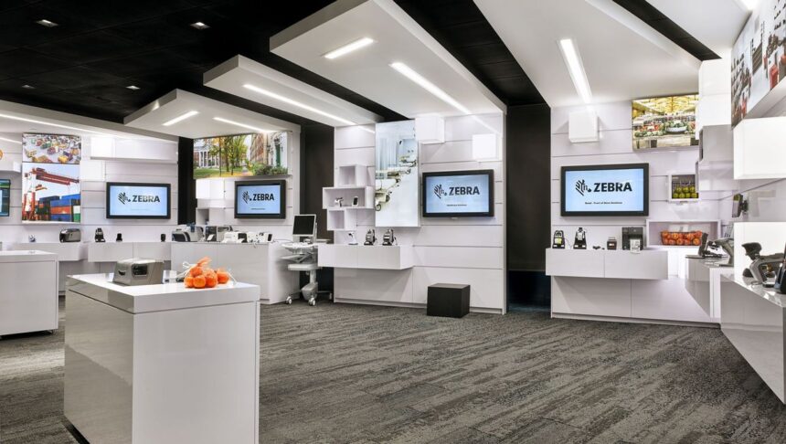 Modern Zebra Technologies showroom featuring retail and healthcare equipment with branding displays.