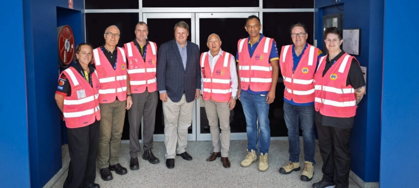 GPC and Manhattan Associates team members standing together at a Brisbane warehouse facility, marking the launch of a next-generation warehouse system.