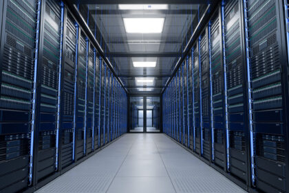 Modern data centre with rows of server racks in a climate-controlled server room.