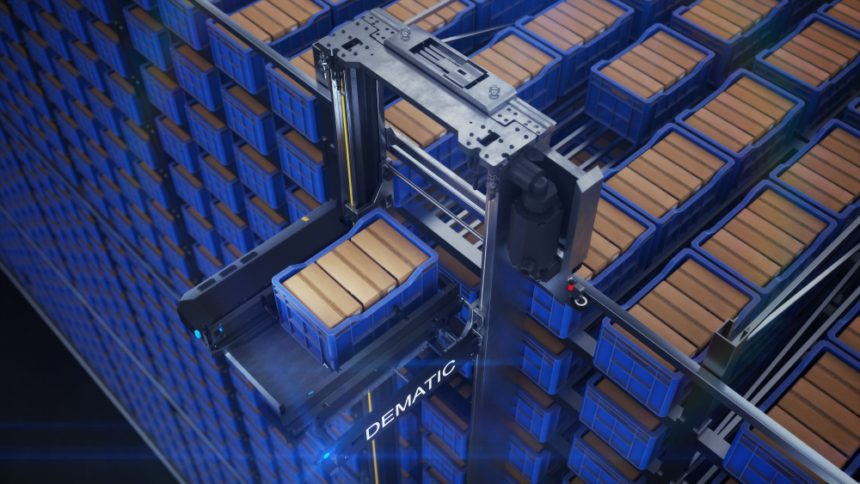 An automated shuttle system retrieves a blue storage tote from a high-density warehouse storage grid filled with stacked containers, illustrating automated goods-to-person fulfilment technology.