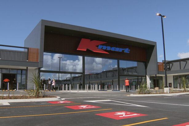 Exterior of a Kmart store with the Kmart logo above the main entrance.